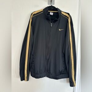 Nike Y2K black gold track jacket sleeve stripes small gold Swoosh logo. Full Zip